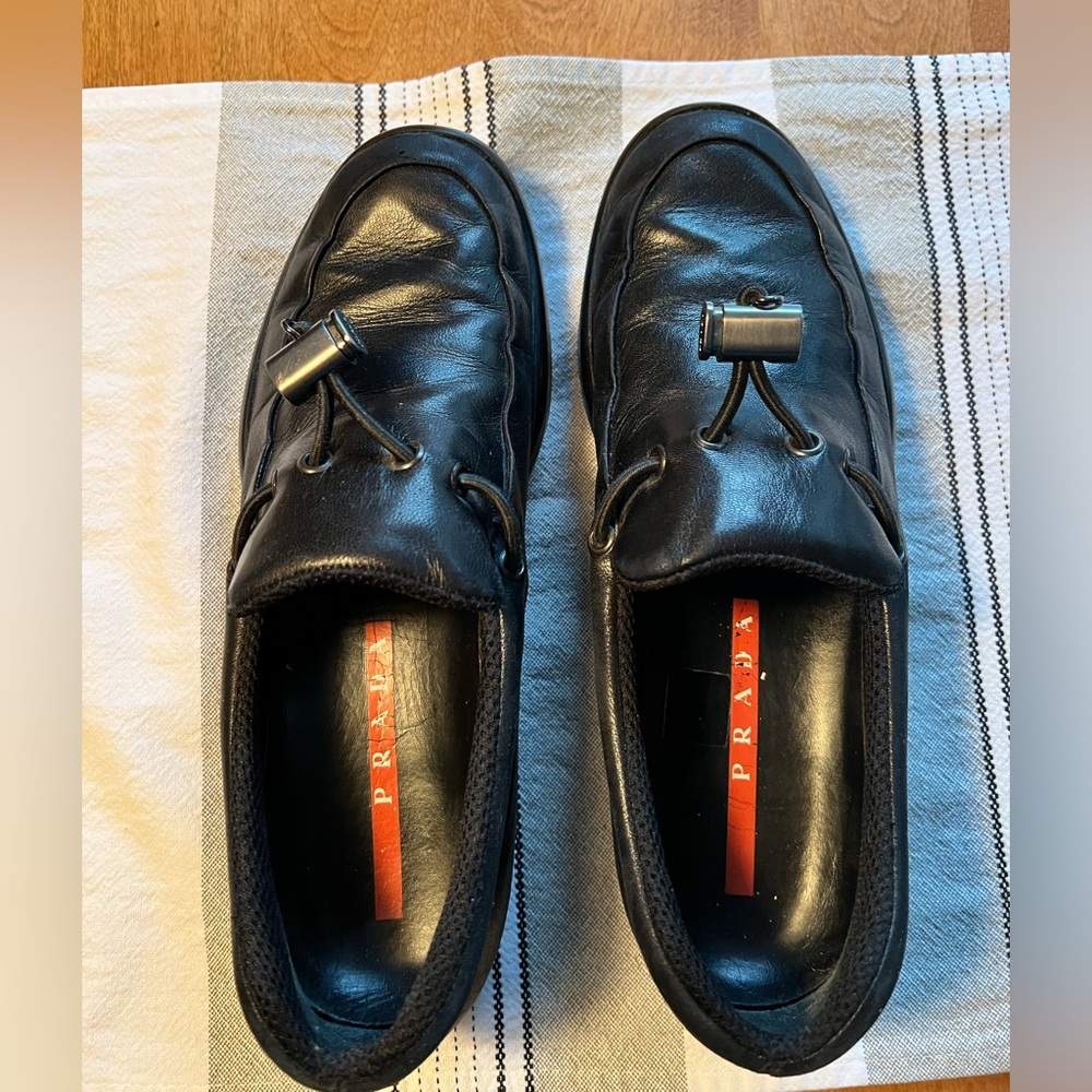 90s vintage black Prada loafers with a vibram sole. size eu 38. Great shape